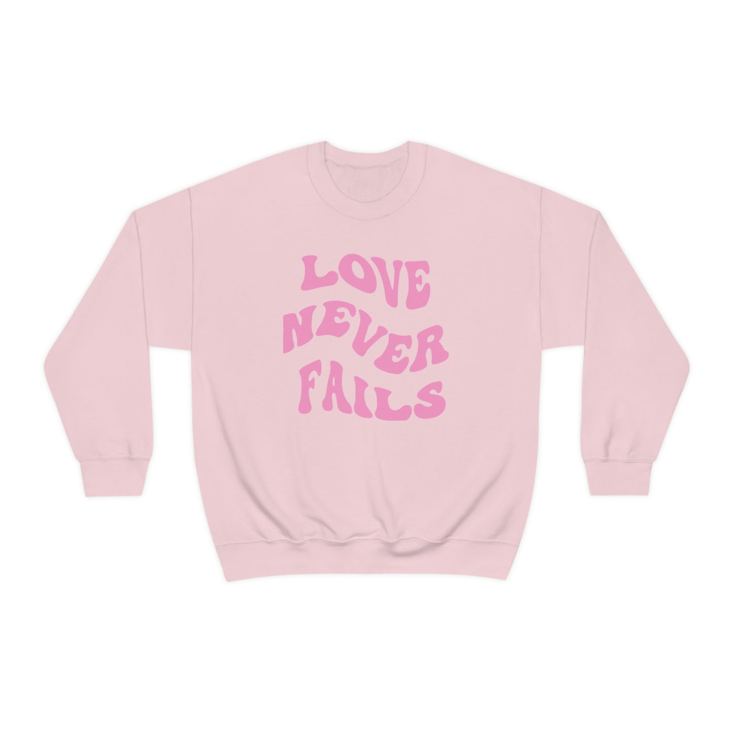 LOVE NEVER FAILS CREWNECK