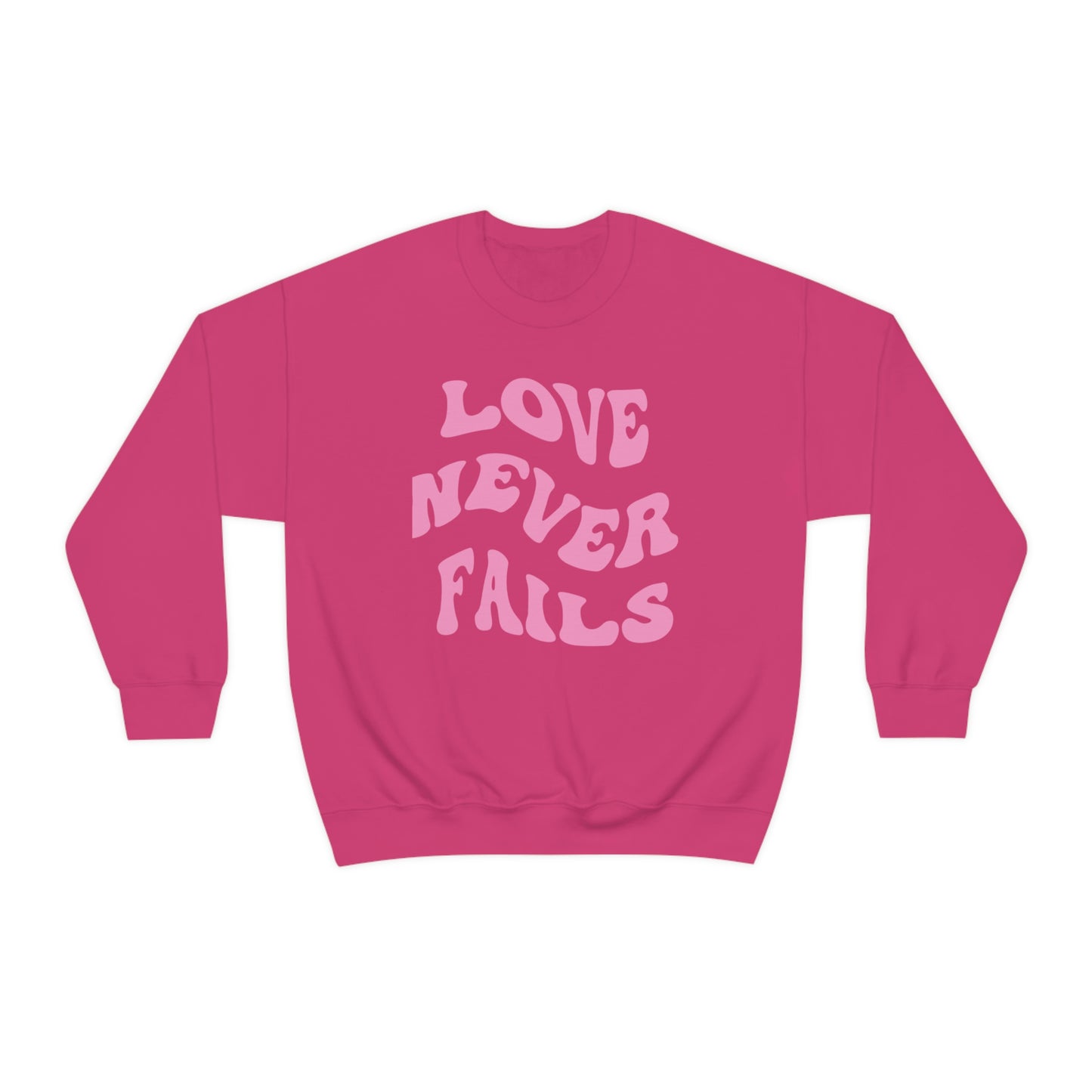 LOVE NEVER FAILS CREWNECK