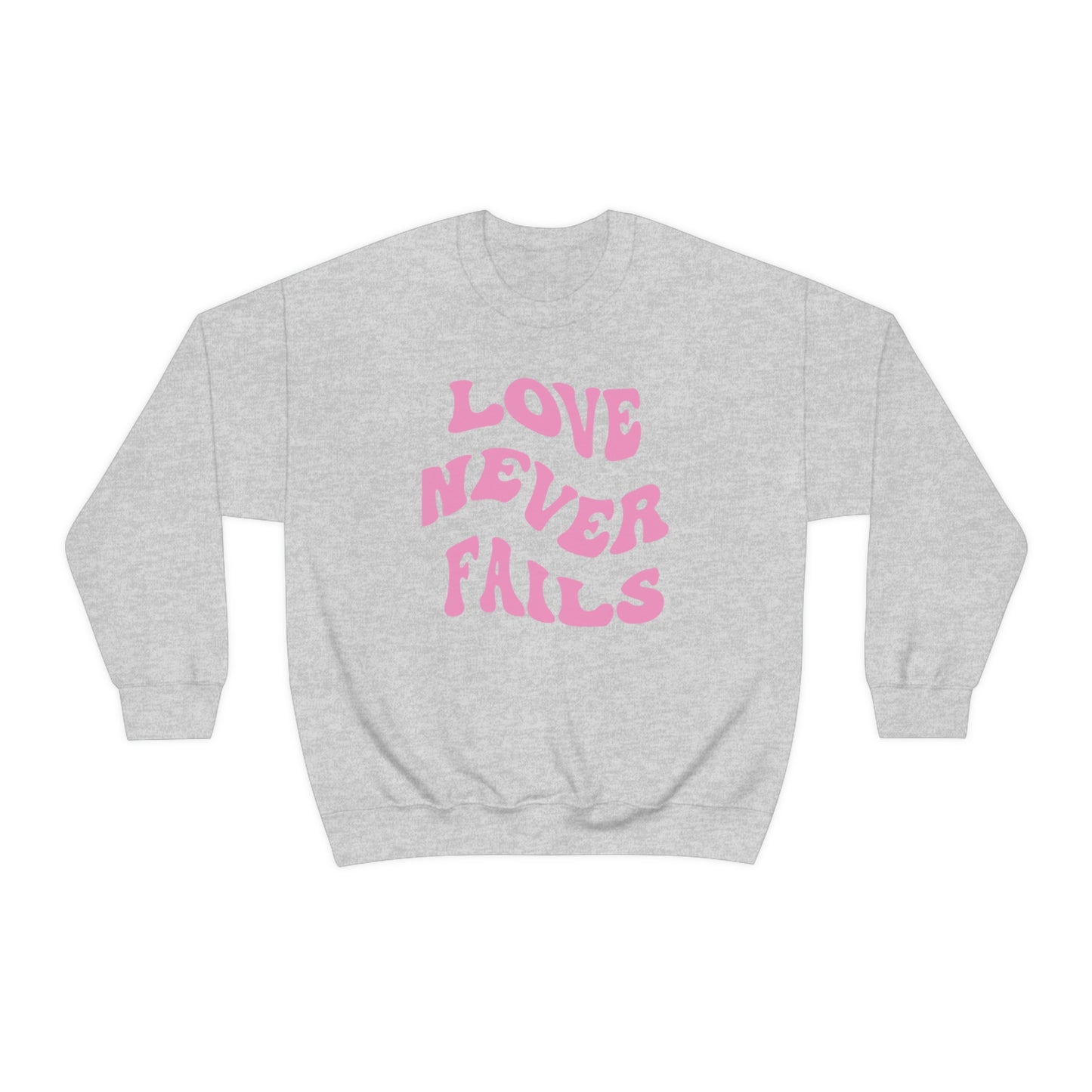 LOVE NEVER FAILS CREWNECK