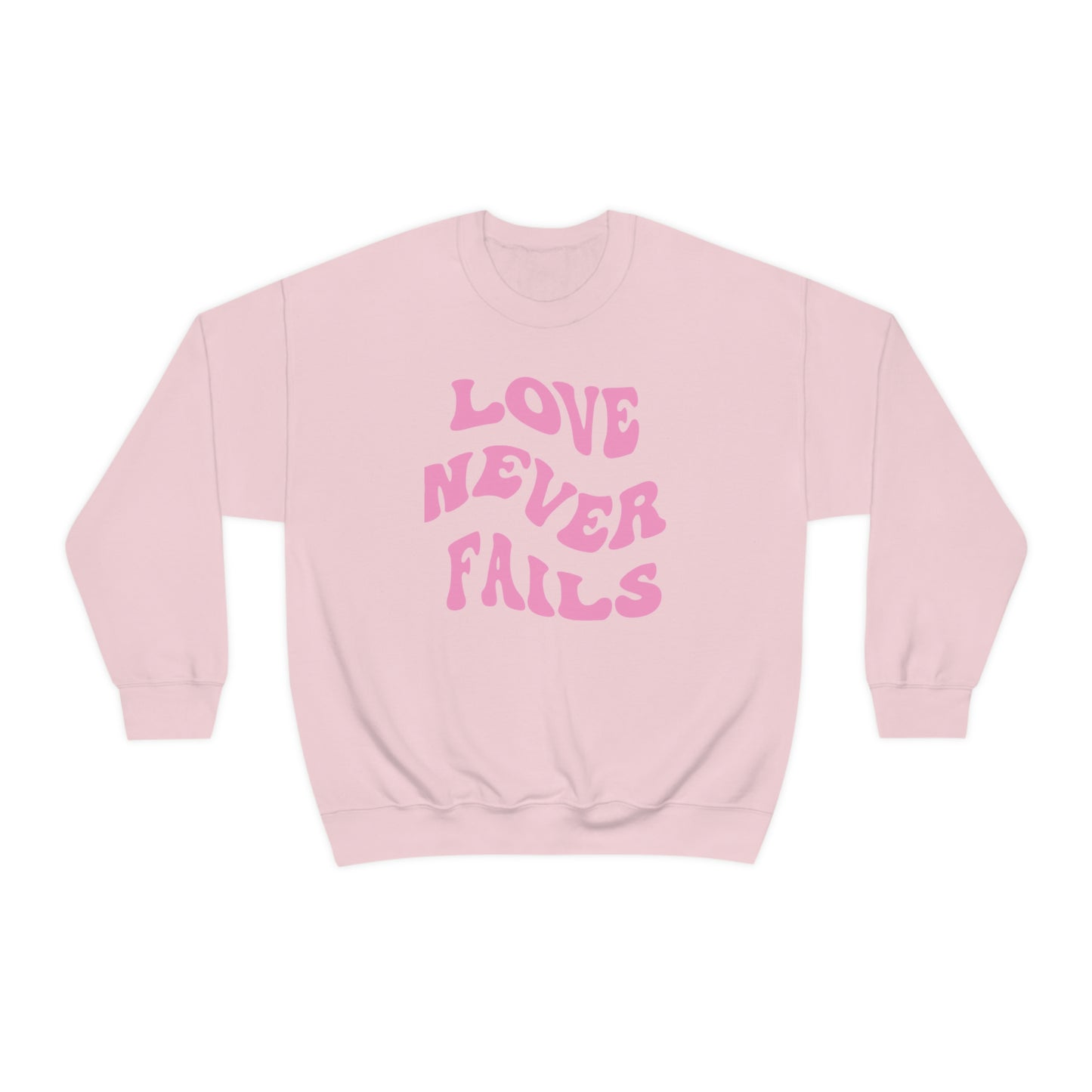 LOVE NEVER FAILS CREWNECK