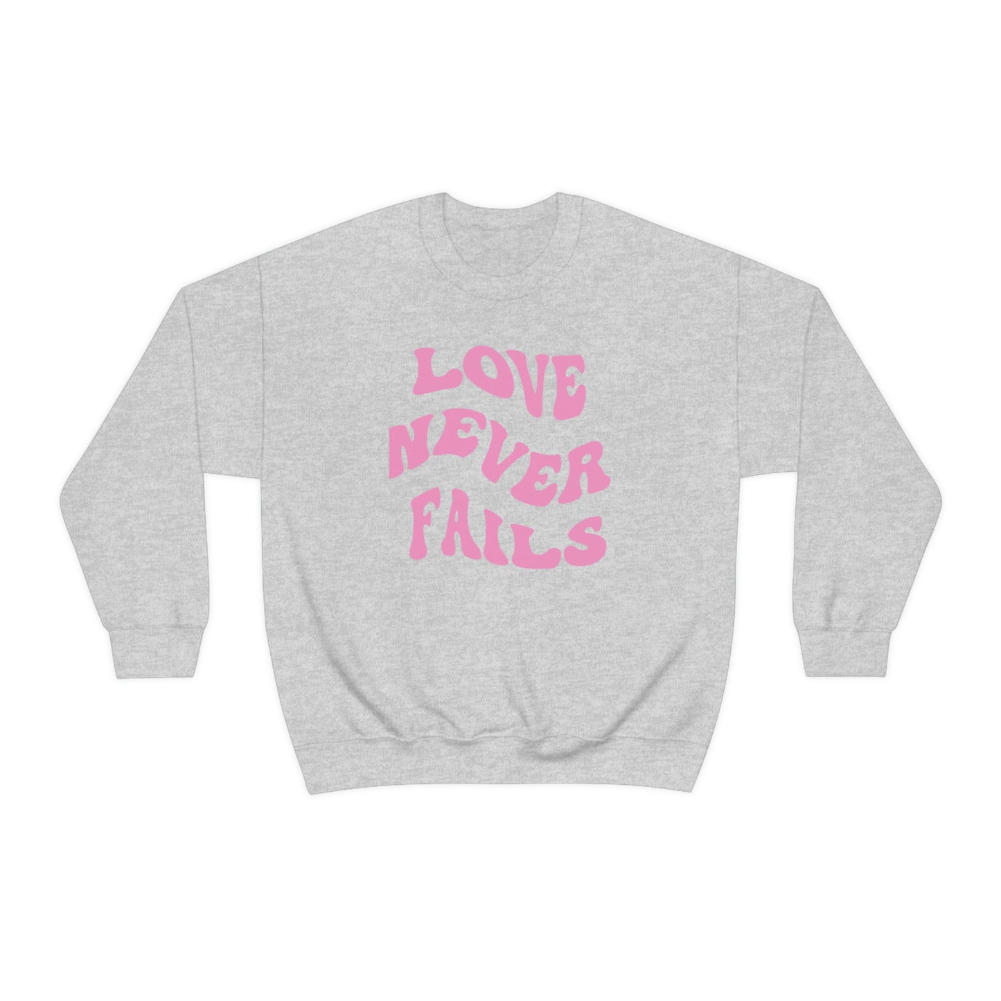 LOVE NEVER FAILS CREWNECK