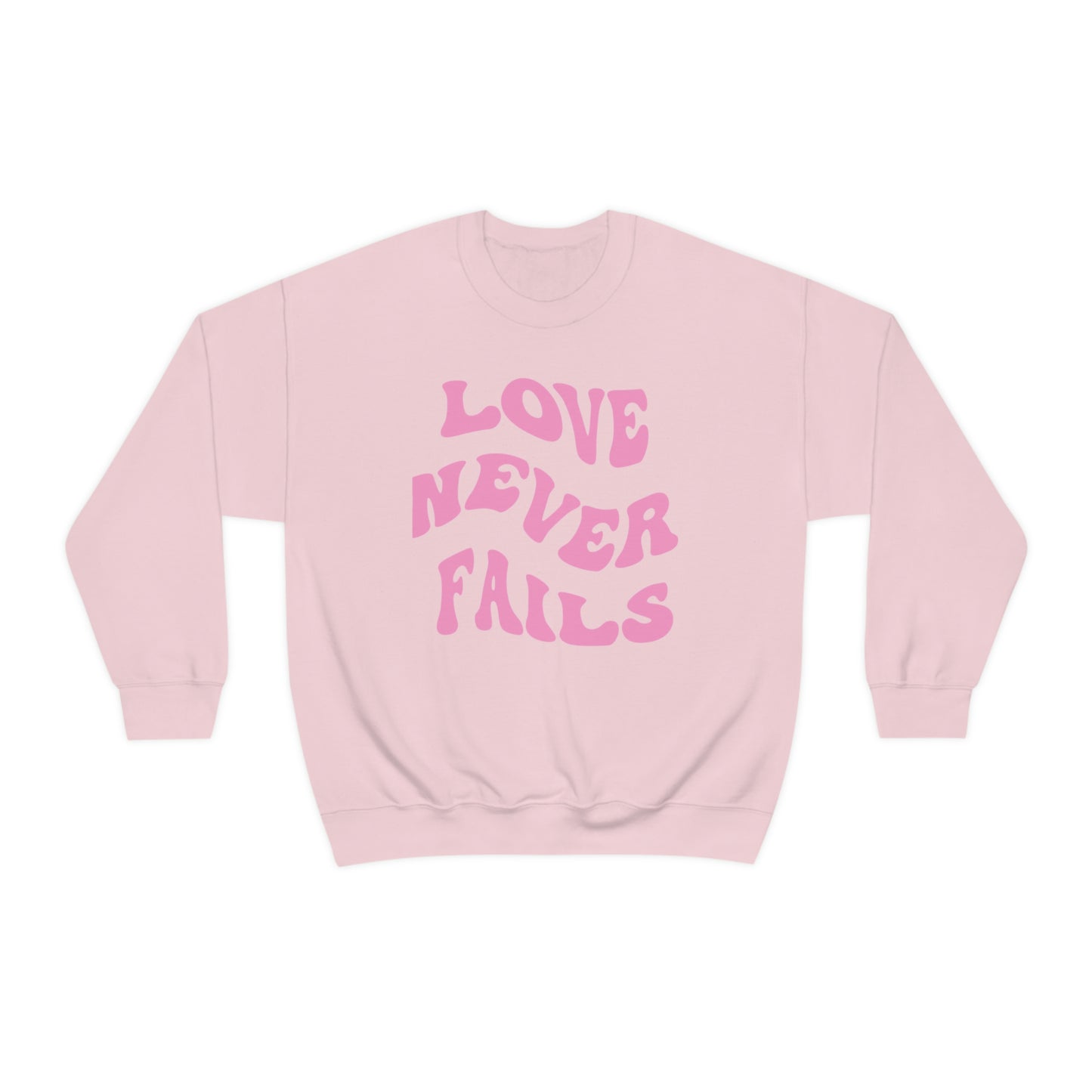 LOVE NEVER FAILS CREWNECK